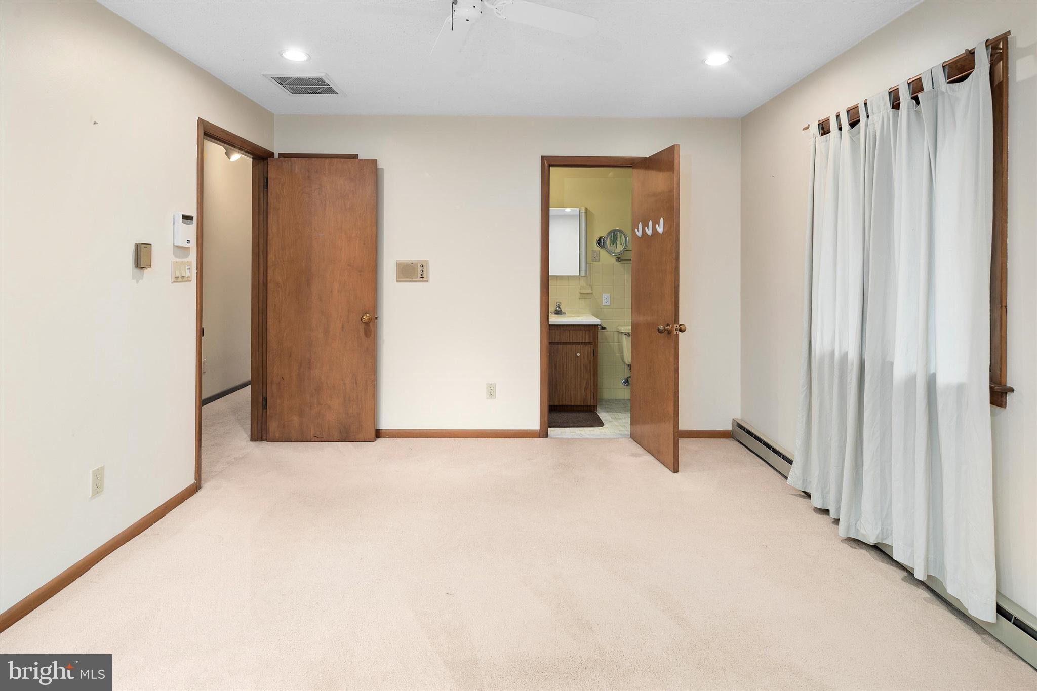8 Lambert Lane Robbinsville, NJ 08691 - Photo 16 of 33 Master Bedroom (Hardwood floors beneath carpets)