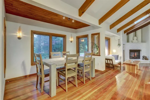 a bedroom with a bed and a fireplace