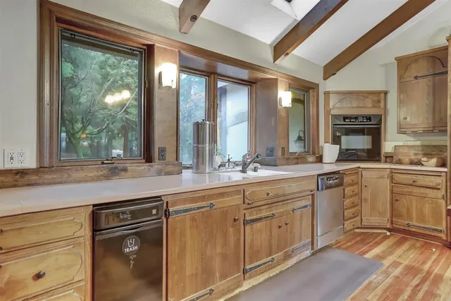 a bedroom with a large bed and a couch