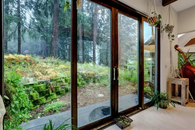 a bathroom with a shower and a sink