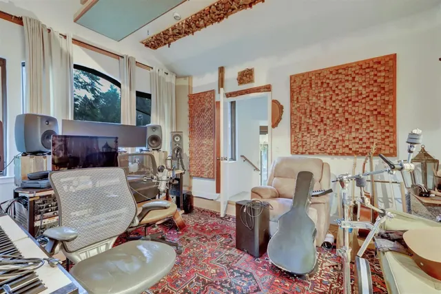 a bedroom with a bed and a walk in closet