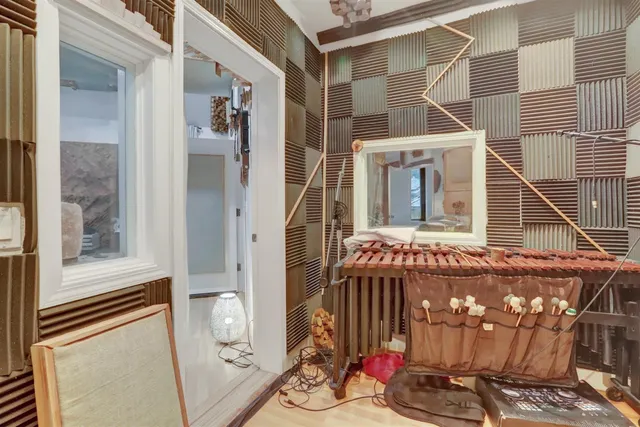 a front view of a house with a yard swimming pool and outdoor seating