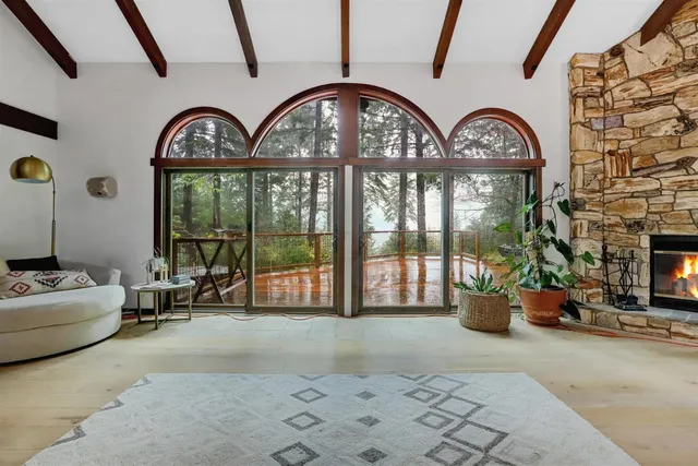 a living room with furniture and a table