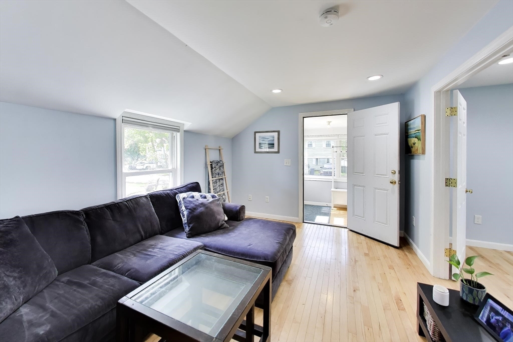 22 Douglas Road Ashland, MA 01721 - Photo 7 of 24 a living room with furniture and wooden floor