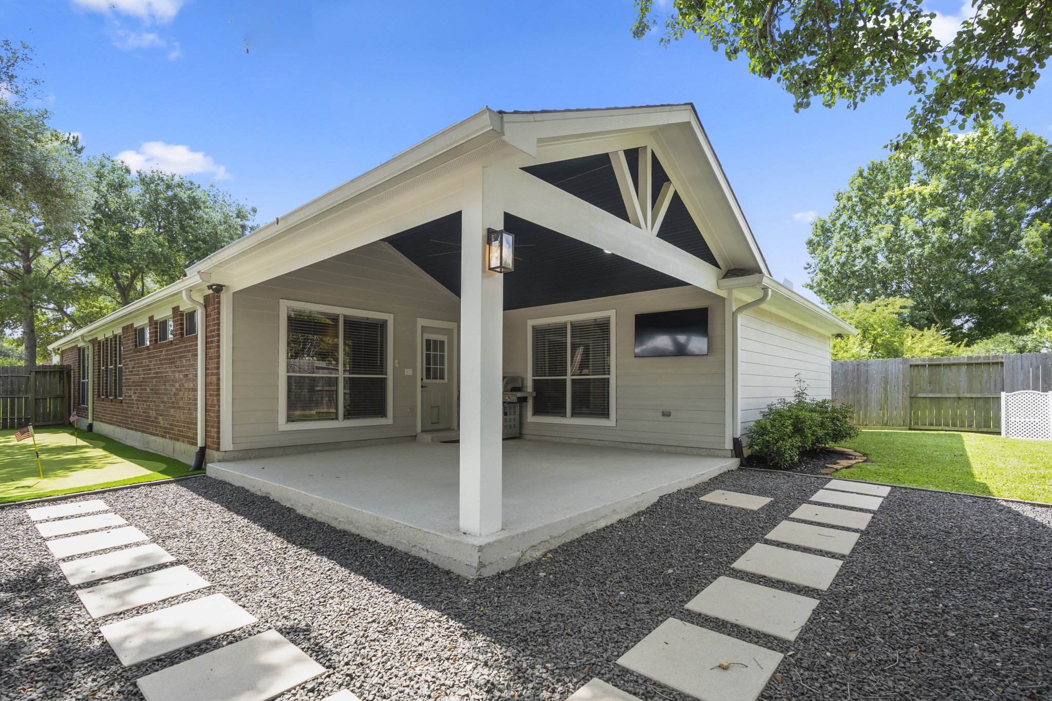 5802 Sawyer Bend Lane Spring, TX 77379 - Photo 31 of 50 a front view of a house with garden