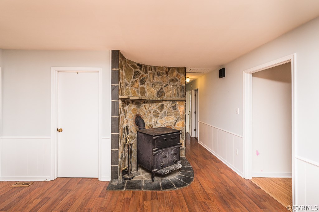 20543 Anderson Mill Road Beaverdam, VA 23015 - Photo 8 of 18 a view of a room with wooden floor and a fireplace