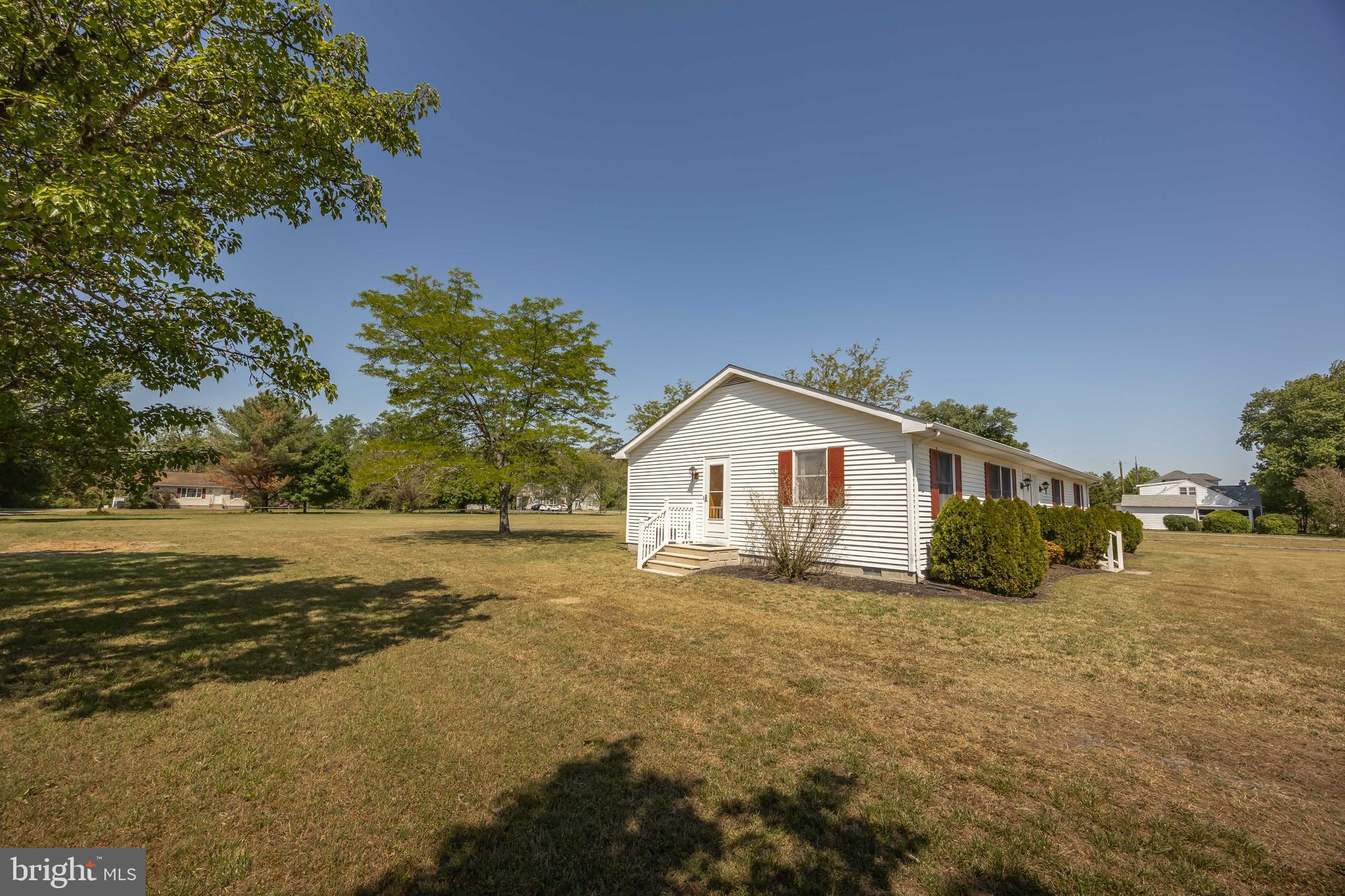 9830 Sharptown Road Mardela Springs, MD 21837 - Photo 3 of 51 a view of a house with a yard