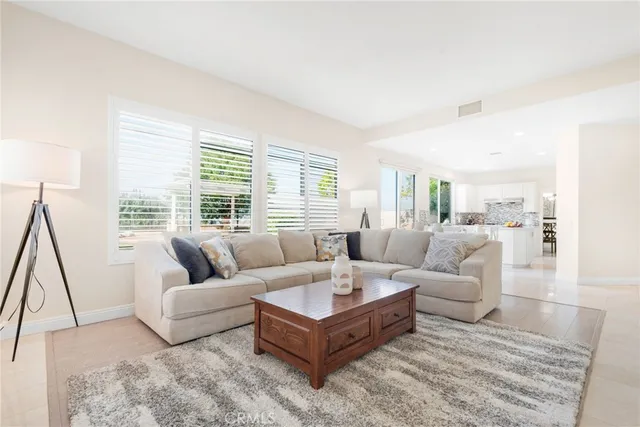 a bathroom with a toilet sink a shower and a mirror