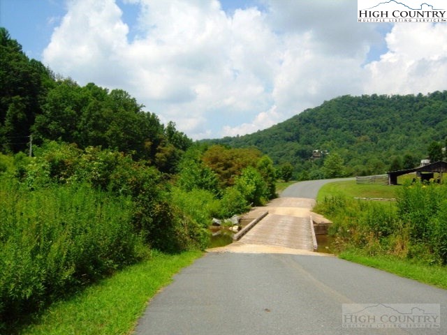2 Old Farm Road Banner Elk, NC 28604 - Photo 18 of 23 a view of a garden with pathway