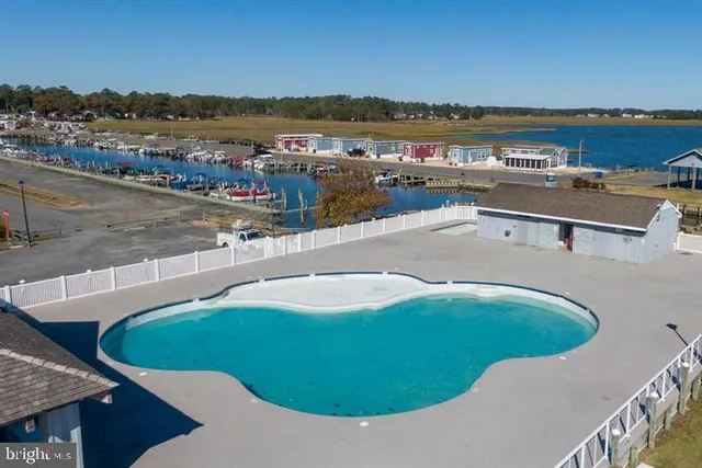 a view of a swimming pool and an ocean view