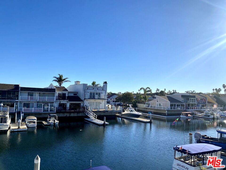 4510 Gateshead Bay Oxnard, CA 93035 - Photo 1 of 36 a view of a lake with building and ocean view