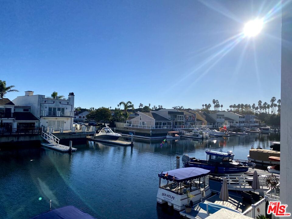 4510 Gateshead Bay Oxnard, CA 93035 - Photo 25 of 36 a view of a lake with tall buildings