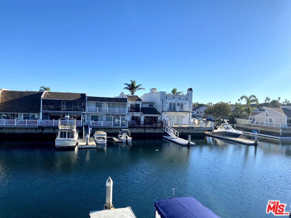4510 Gateshead Bay Oxnard, CA 93035 - Photo 32 of 36 a view of a lake with multiple houses