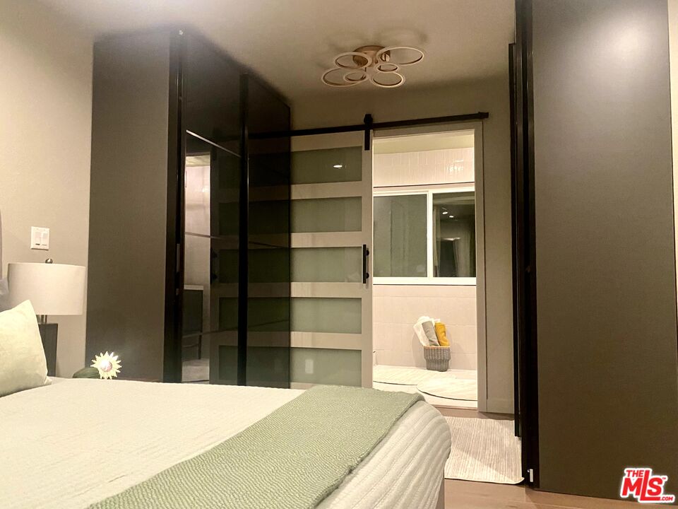 4510 Gateshead Bay Oxnard, CA 93035 - Photo 33 of 36 a bedroom with a bed and a window