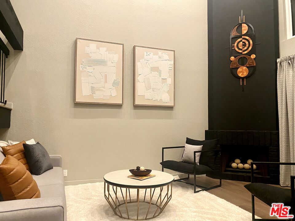 4510 Gateshead Bay Oxnard, CA 93035 - Photo 34 of 36 a living room with furniture and a window