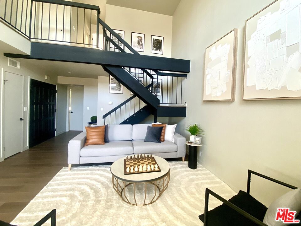 4510 Gateshead Bay Oxnard, CA 93035 - Photo 4 of 36 a living room with furniture and a wooden floor