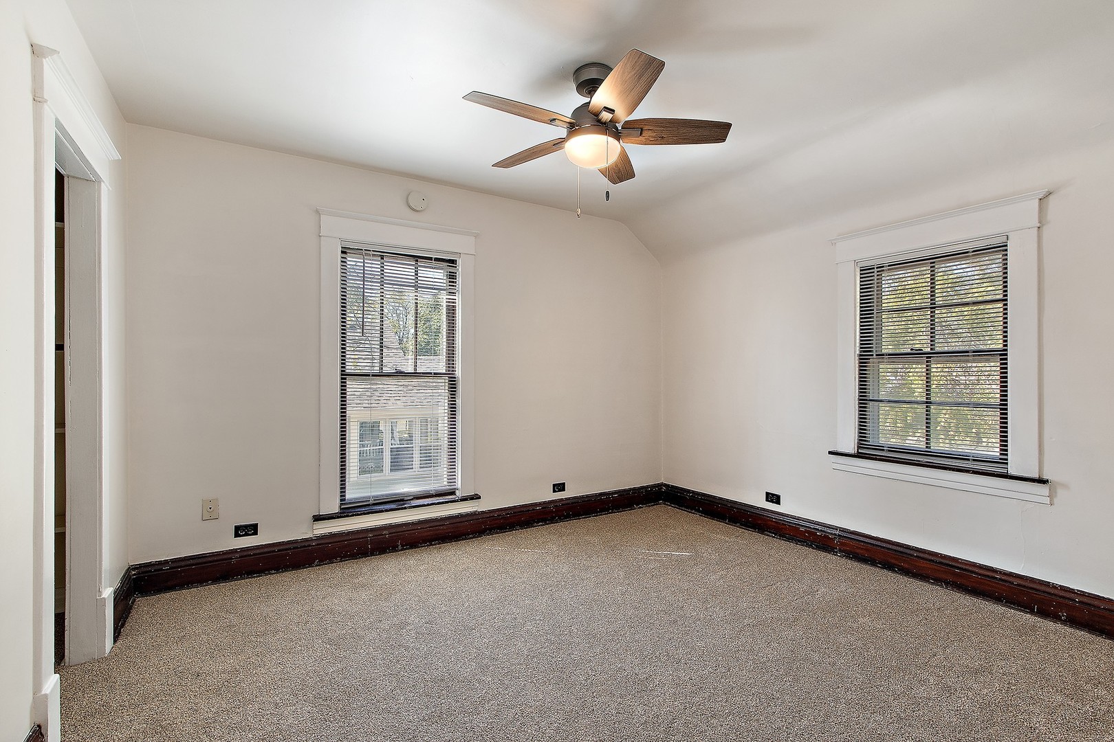 1525 Burr Oak Road Homewood, IL 60430 - Photo 15 of 20 an empty room with windows and fan