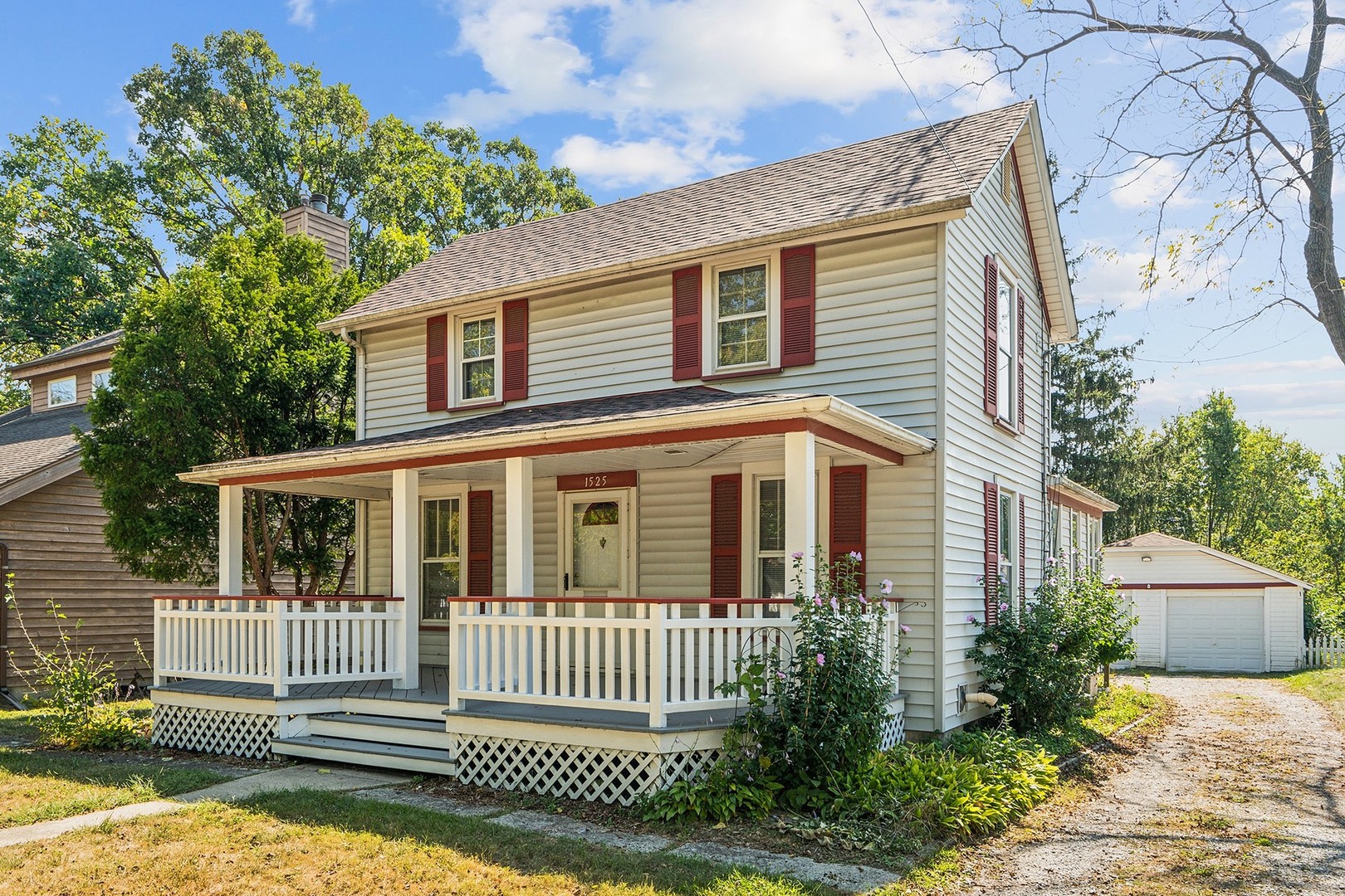 1525 Burr Oak Road Homewood, IL 60430 - Photo 2 of 20 a front view of a house with a garden