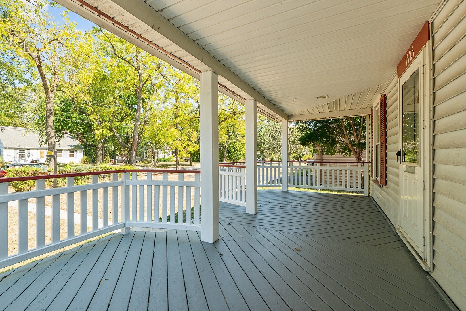 1525 Burr Oak Road Homewood, IL 60430 - Photo 3 of 20 a view of a porch with wooden floor