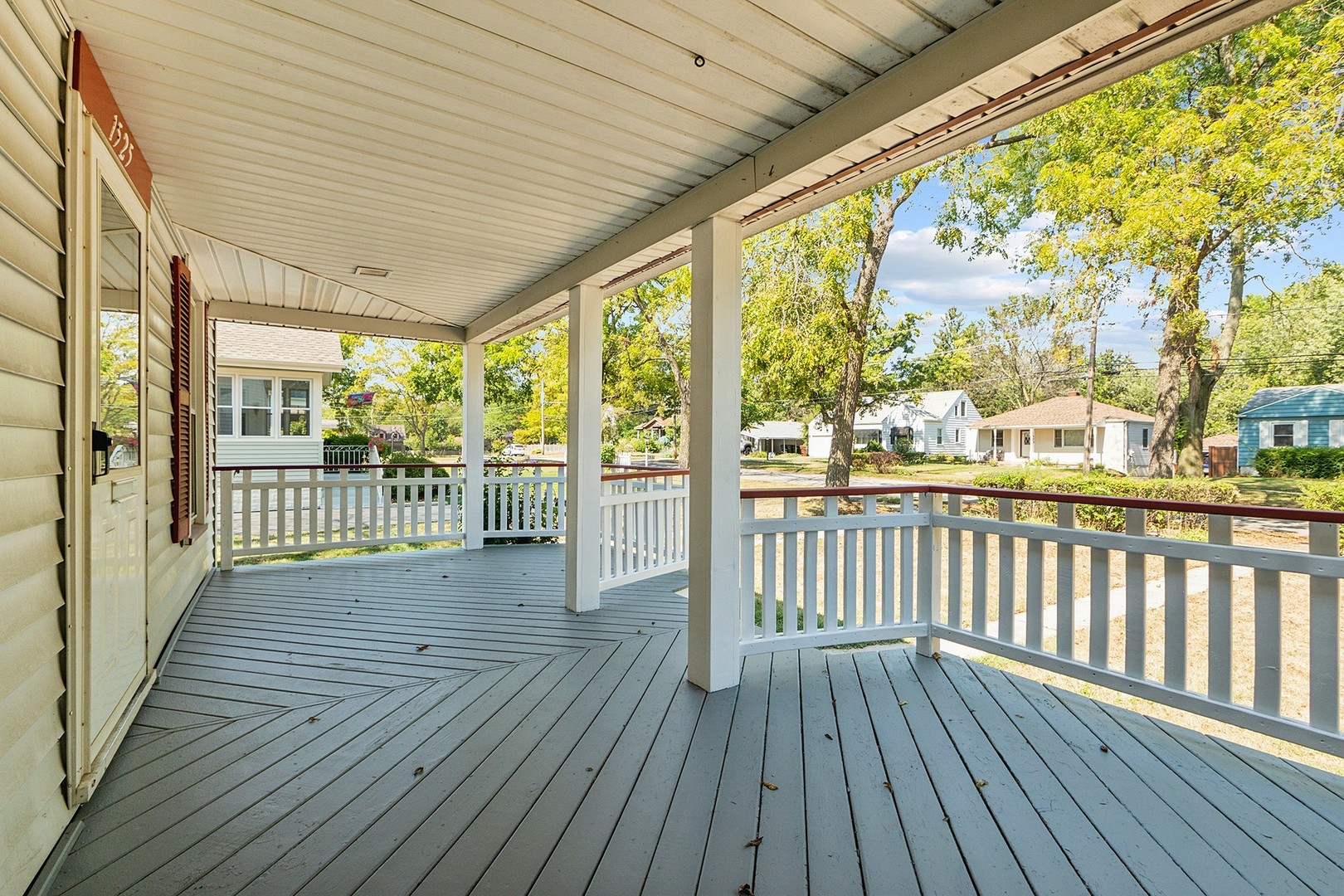 1525 Burr Oak Road Homewood, IL 60430 - Photo 4 of 20 a view of a porch with wooden floor