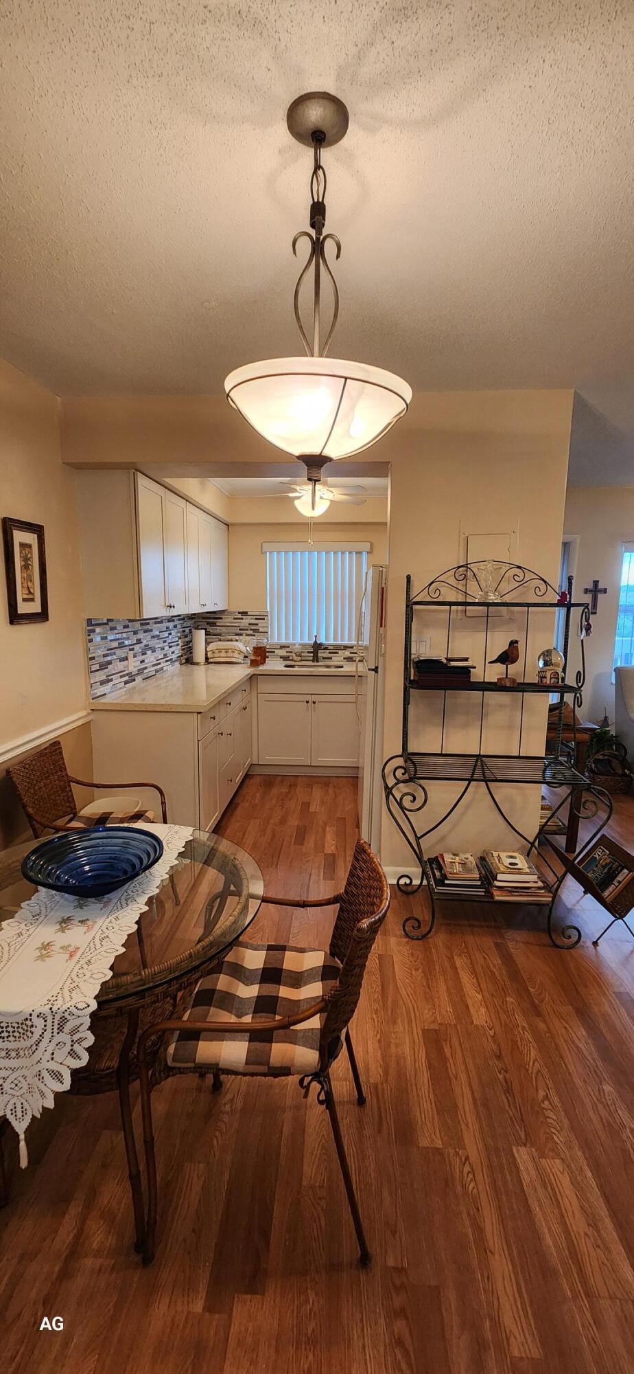 15 Southeast 13th Street, Unit D3 Boca Raton, FL 33432 - Photo 11 of 36 dining to kitchen