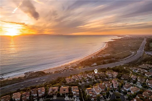 a view of swimming pool with outdoor seating