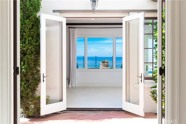 a view of a swimming pool with a lounge chairs
