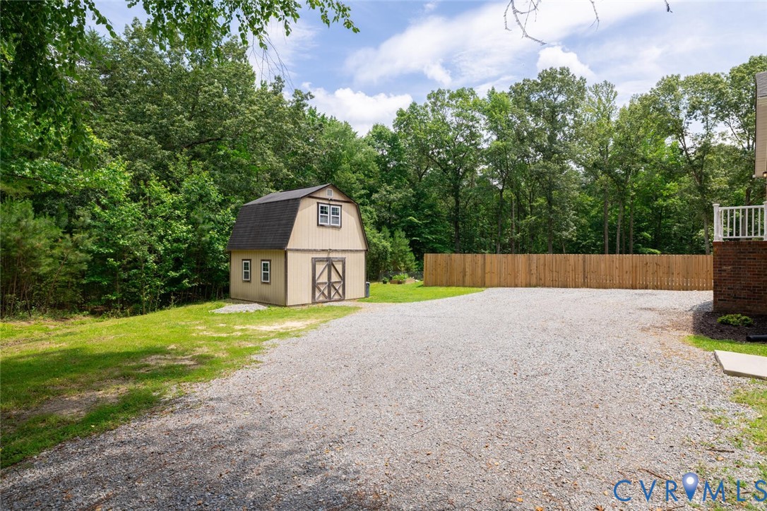 12397 New Market Mill Road Beaverdam, VA 23015 - Photo 39 of 44 a house view with a outdoor space