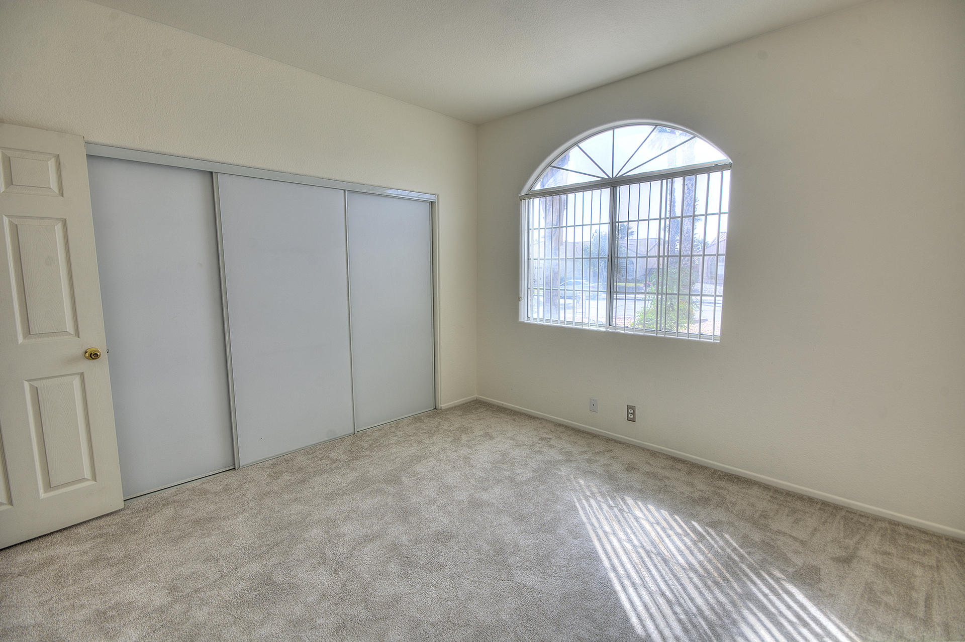 68392 Riviera Road Cathedral City, CA 92234 - Photo 11 of 21 an empty room with windows