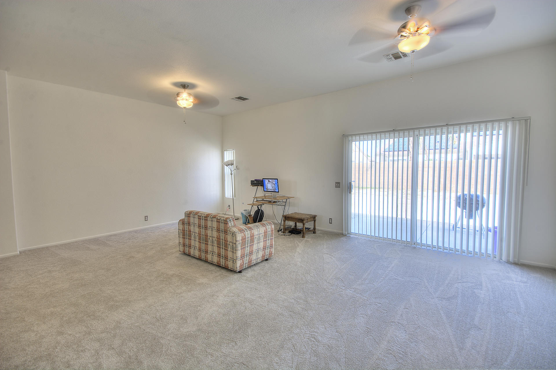 68392 Riviera Road Cathedral City, CA 92234 - Photo 5 of 21 a view of livingroom with furniture and chandelier fan