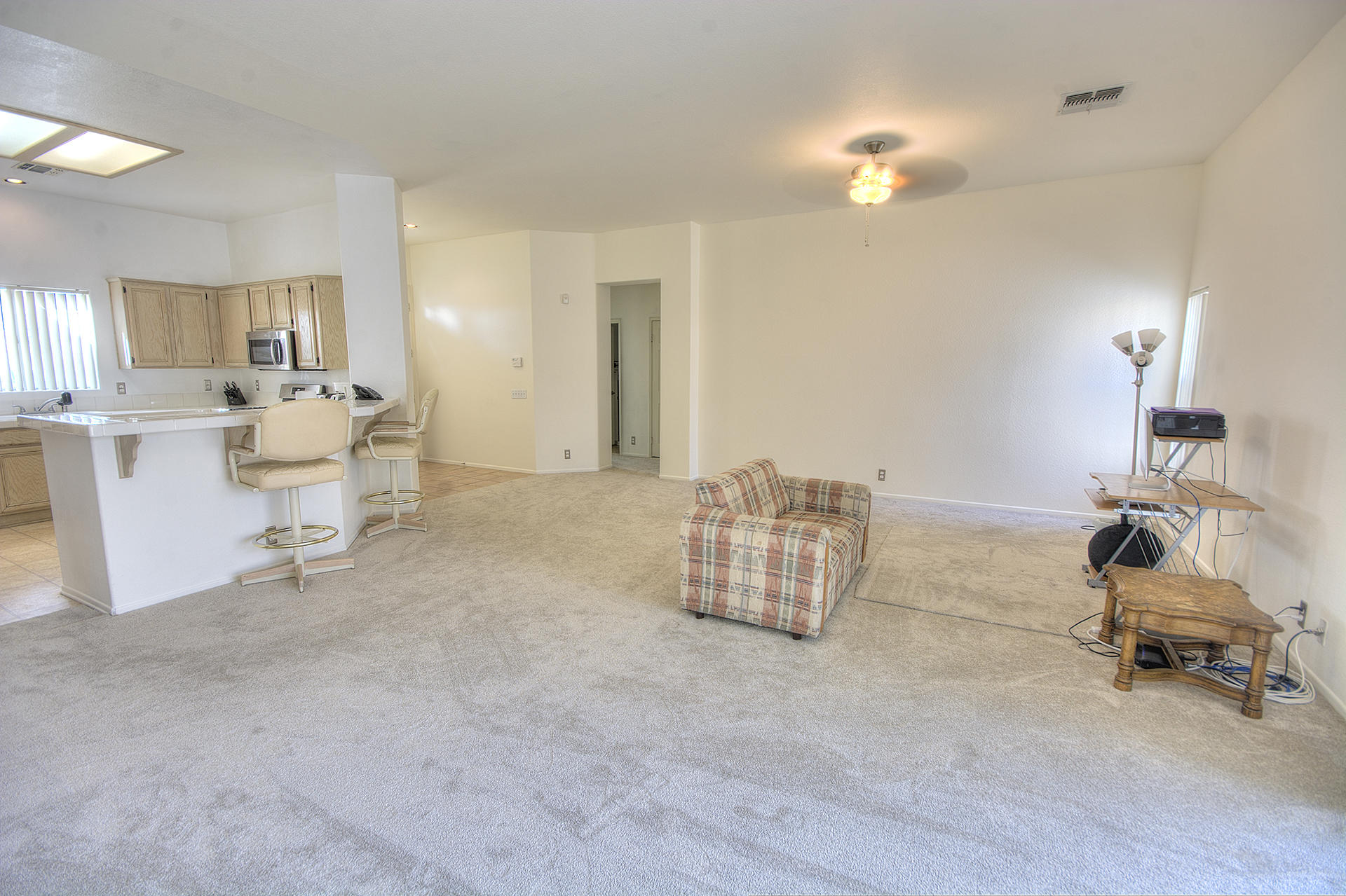 68392 Riviera Road Cathedral City, CA 92234 - Photo 6 of 21 a living room with furniture and a couch
