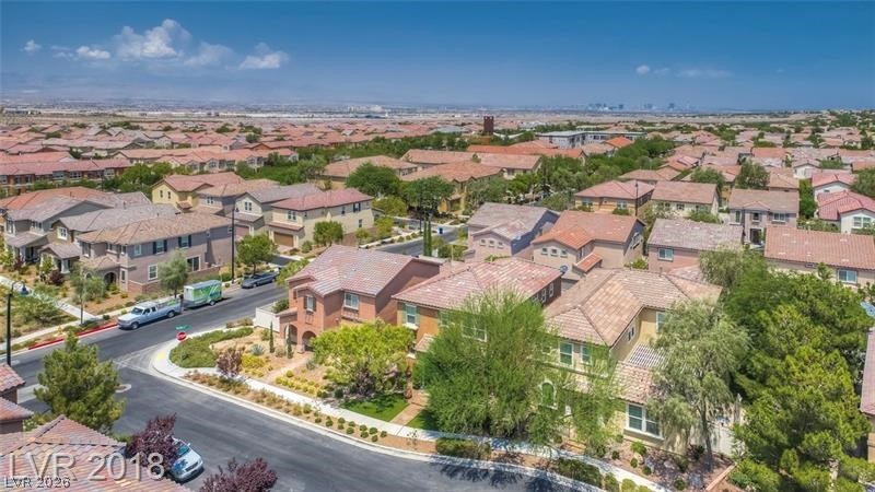 3144 Whitfeild Avenue Henderson, NV 89044 - Photo 41 of 55 An aerial perspective reveals a dense, well-maintained neighborhood with distinct red-tiled roofs.