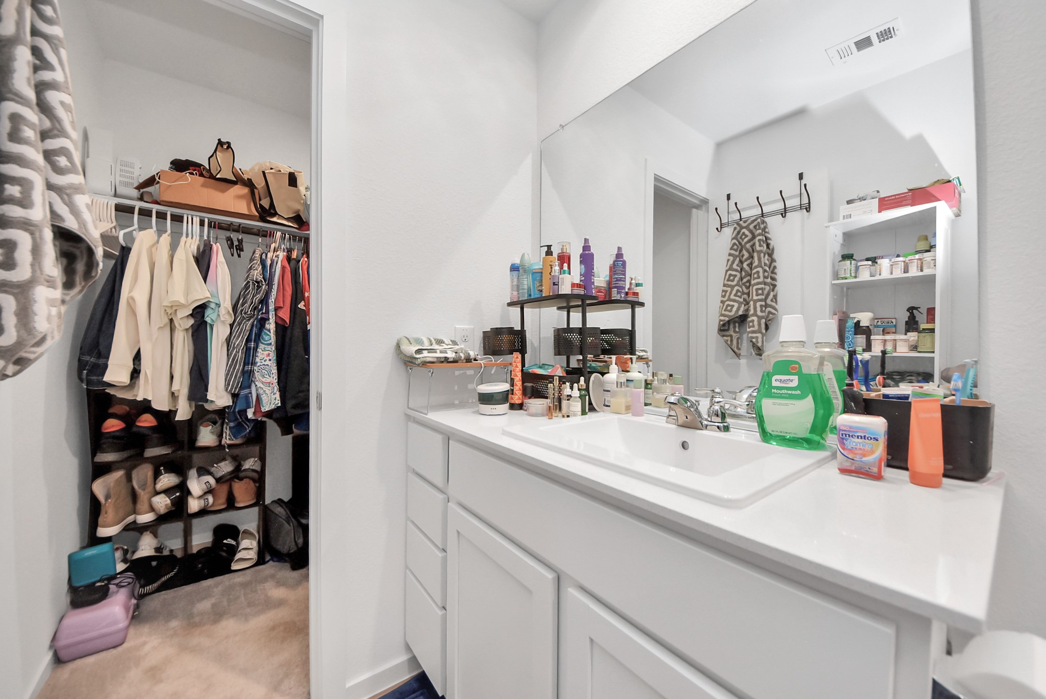 1719 Windrose Bend Angleton, TX 77515 - Photo 22 of 31 a bathroom with a sink and a mirror