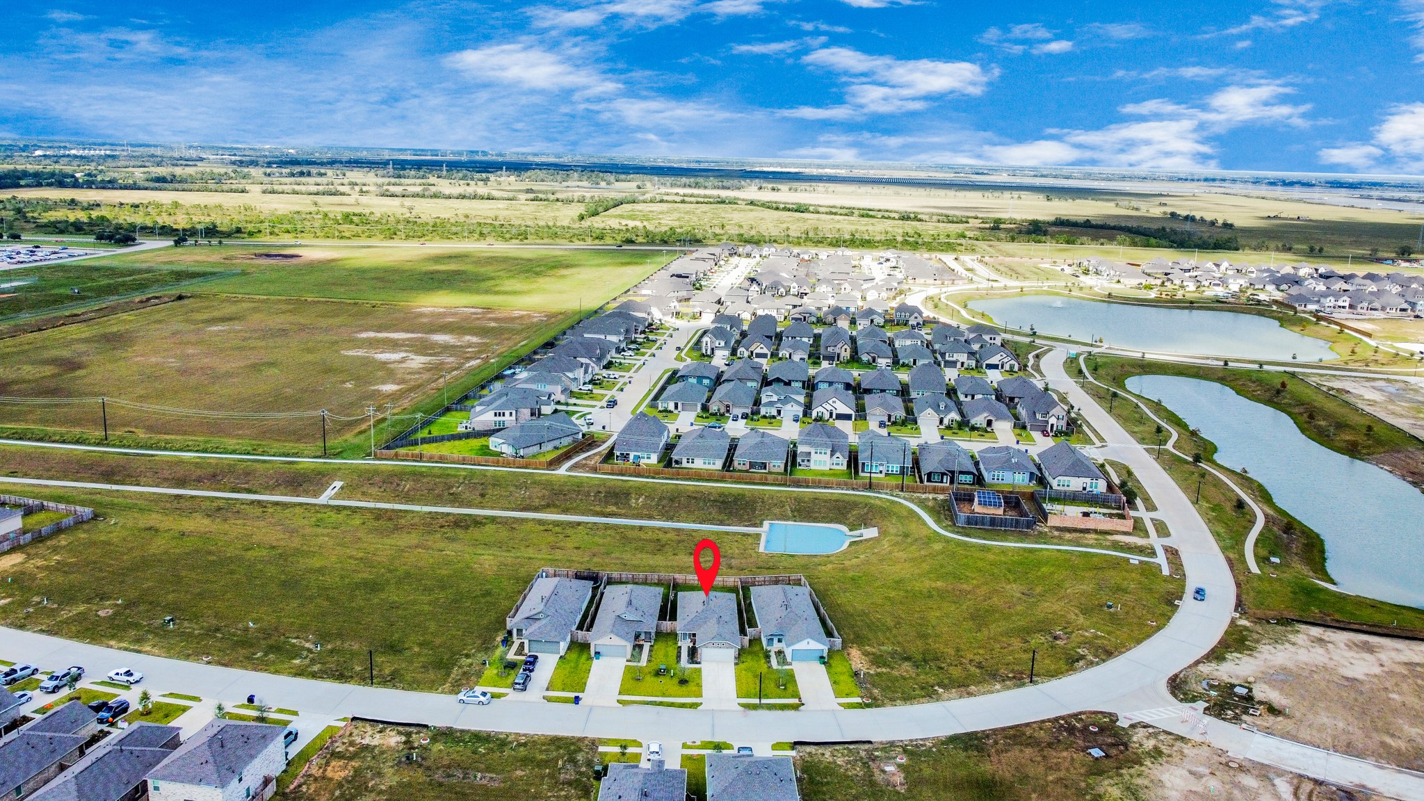 1719 Windrose Bend Angleton, TX 77515 - Photo 4 of 31 a view of a swimming pool with a lot of chairs
