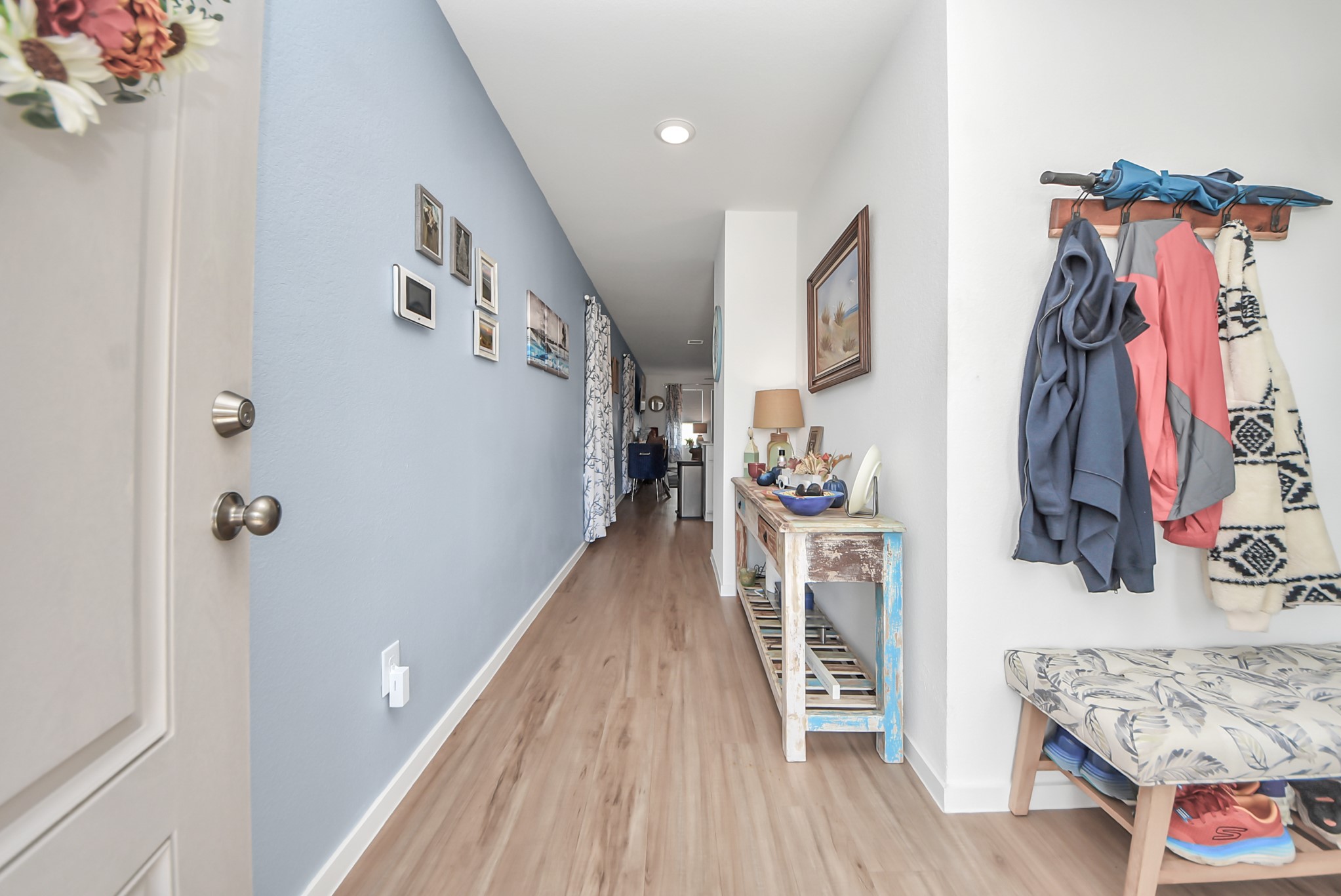 1719 Windrose Bend Angleton, TX 77515 - Photo 5 of 31 a view of walk in closet with clothes and shoes
