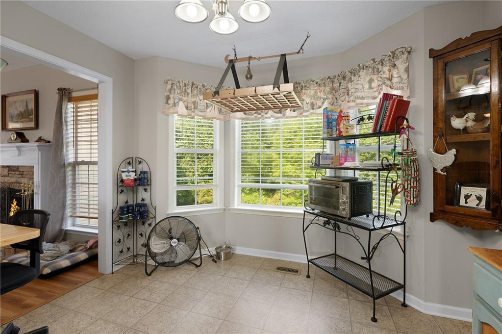 240 Orchard Way Southeast Calhoun, GA 30701 - Photo 12 of 38 a view of a livingroom with furniture and a window
