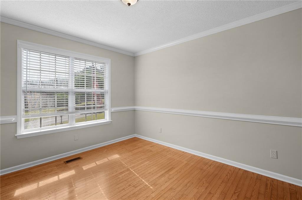 240 Orchard Way Southeast Calhoun, GA 30701 - Photo 15 of 38 a view of an empty room with a window