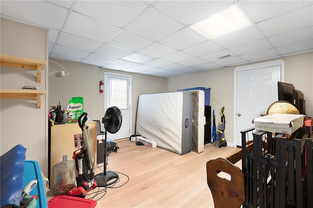240 Orchard Way Southeast Calhoun, GA 30701 - Photo 24 of 38 a view of a livingroom with furniture and a gym