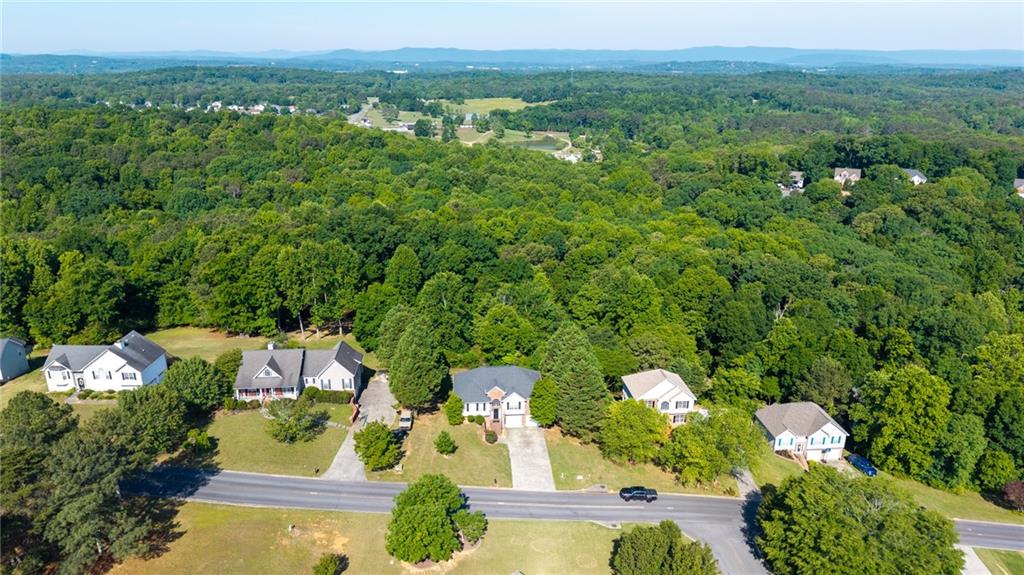 240 Orchard Way Southeast Calhoun, GA 30701 - Photo 36 of 38 an aerial view of a houses with a yard