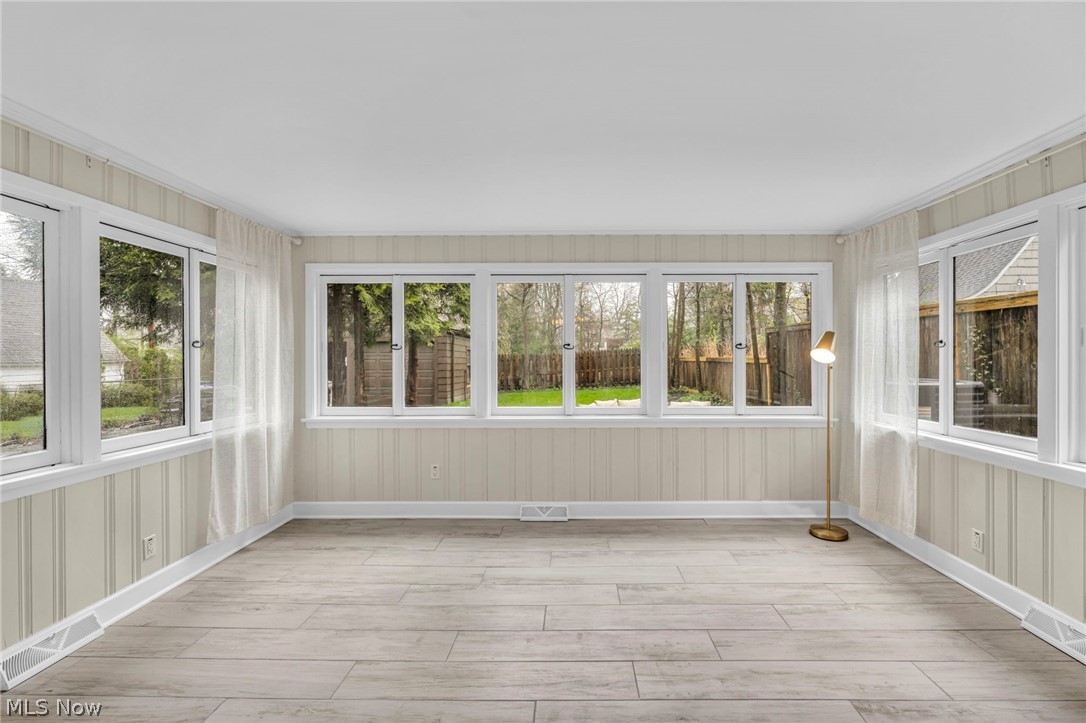 17409 Fernway Road Cleveland, OH 44120 - Photo 22 of 47 Unfurnished sunroom with a healthy amount of sunlight