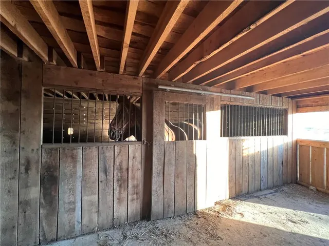 a view of a livingroom with furniture