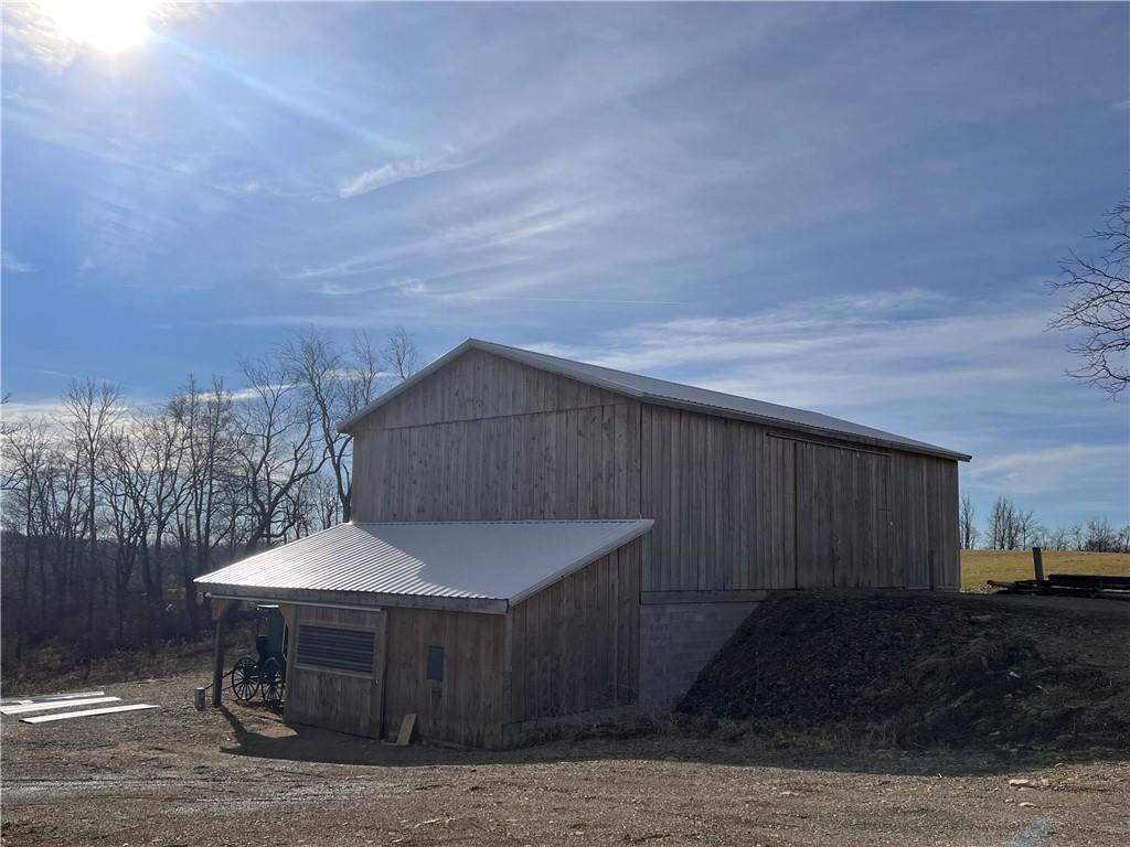 2118 Lantz Road Punxsutawney, PA 15767 - Photo 26 of 38 a backyard of a house with table and chairs
