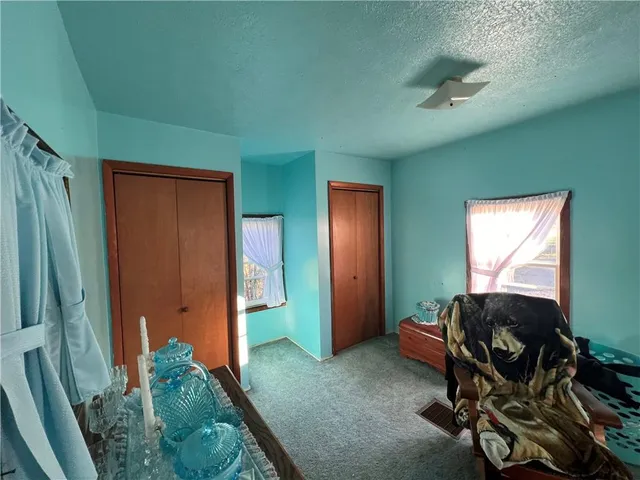 a workspace with furniture and a window