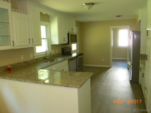 160 Arkwright Road North Chesterfield, VA 23236 - Photo 3 of 10 a kitchen with a sink and a view of living room