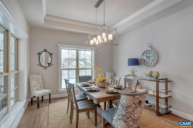 a living room with furniture a lamp and a fireplace