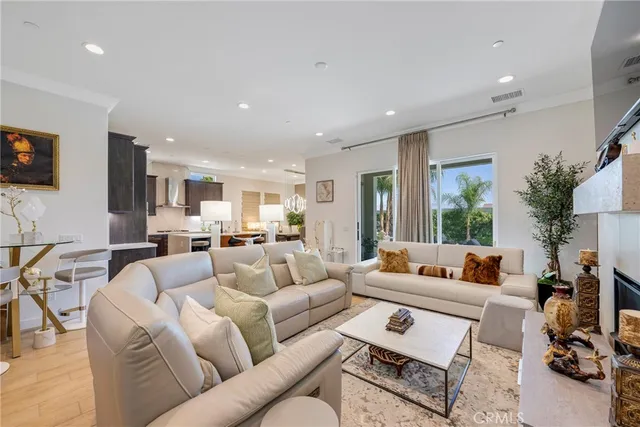 a large kitchen with a large counter top appliances and cabinets