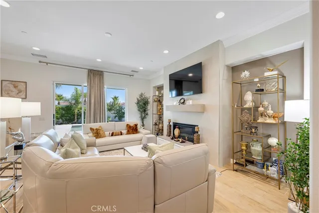 a kitchen with stainless steel appliances a sink a counter top space cabinets and a stove