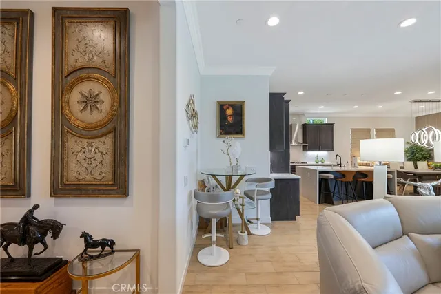 a kitchen with a sink dishwasher stove and cabinets