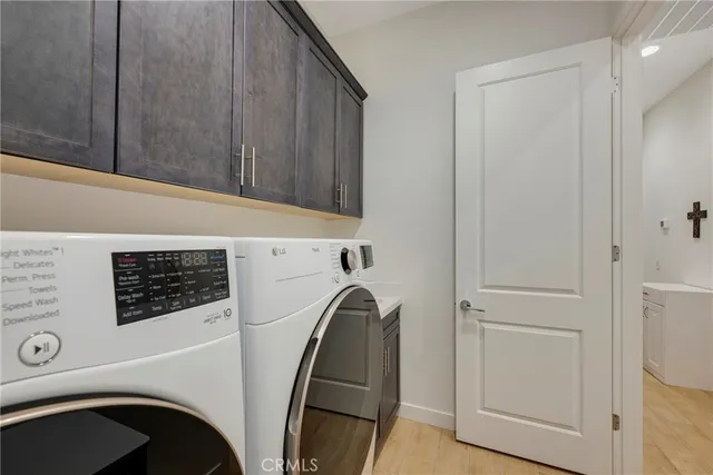a living room with furniture and a book shelf