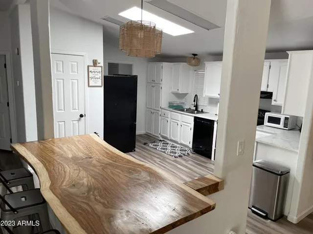 a area with table tennis and stairs